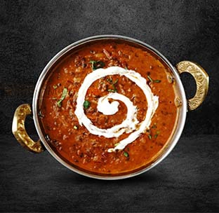 Slow cooked north indian dal makhani with black lentils butter and cream at western restaurant singapore